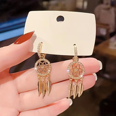 Light Mesh Tassel Drop Earrings with Rhinestone and Feather Details