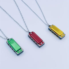 Small Harmonica 4 hole 8 note Necklace Mini Harmonica Playing