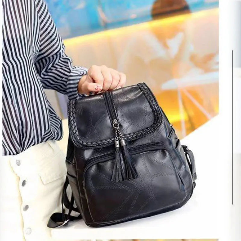 Vintage Leather Anti-Theft Backpack with Tassel Accent