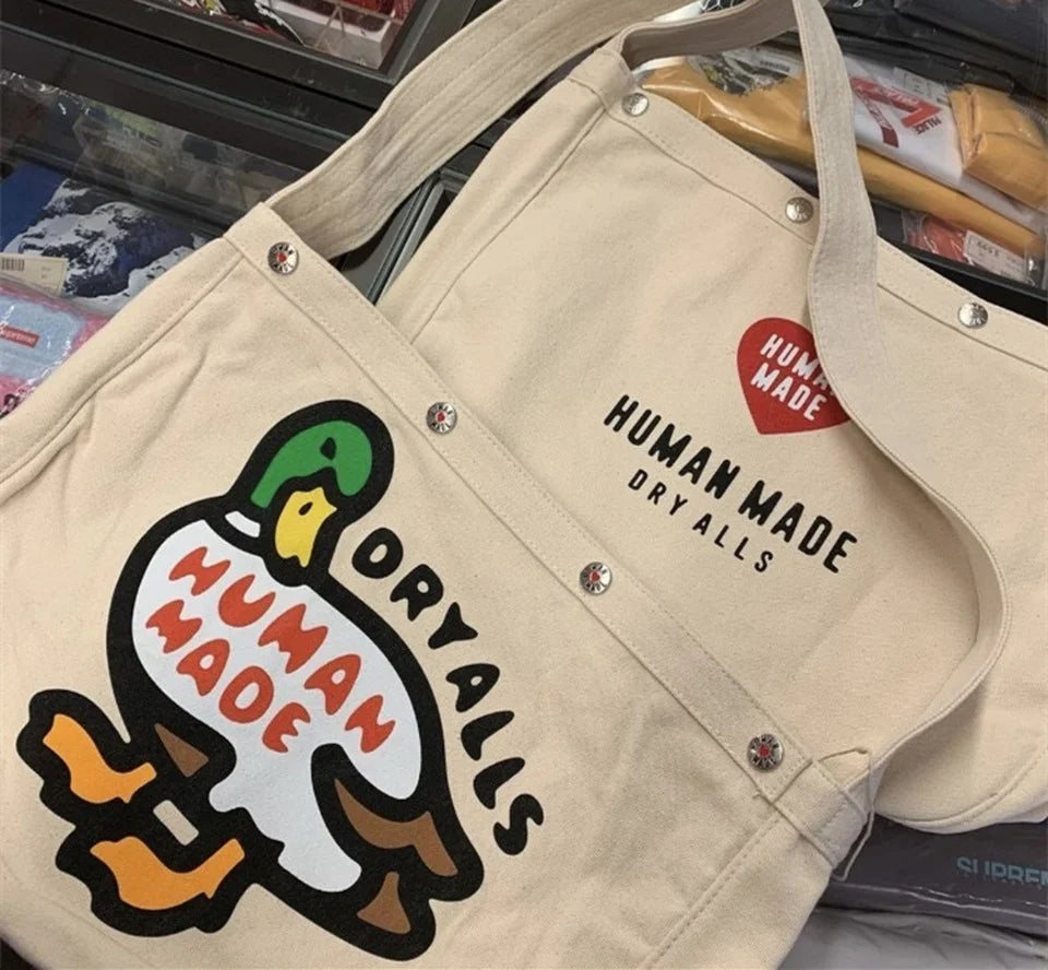 Khaki Canvas Duck Backpacks Cartoon Graphic Snap Button Human Heart Bag