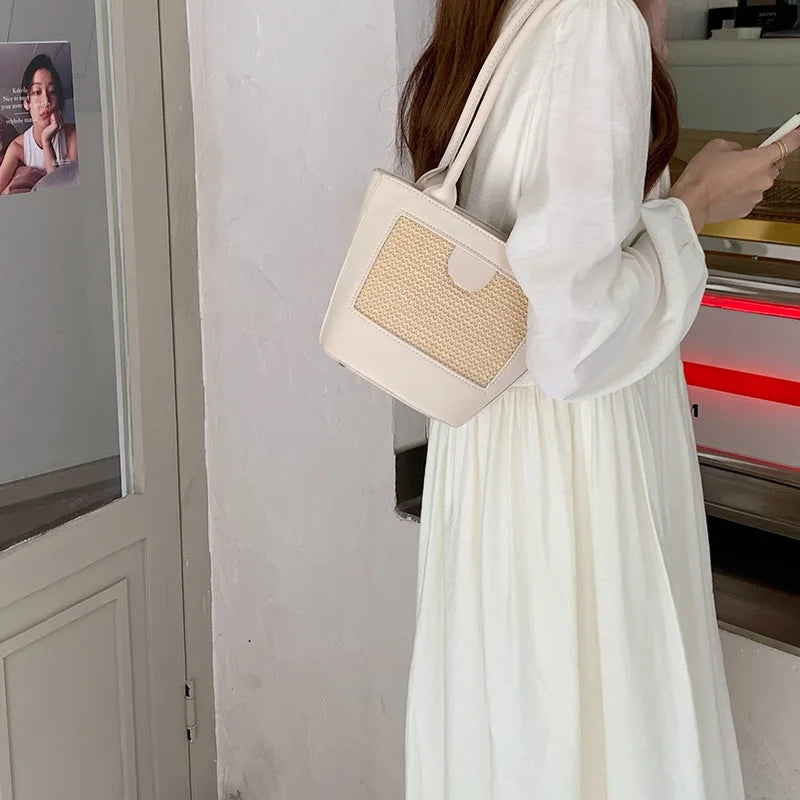 Niche Straw Bucket Bag Female Portable Small Bag Retro Hand Carrying Shoulder Un