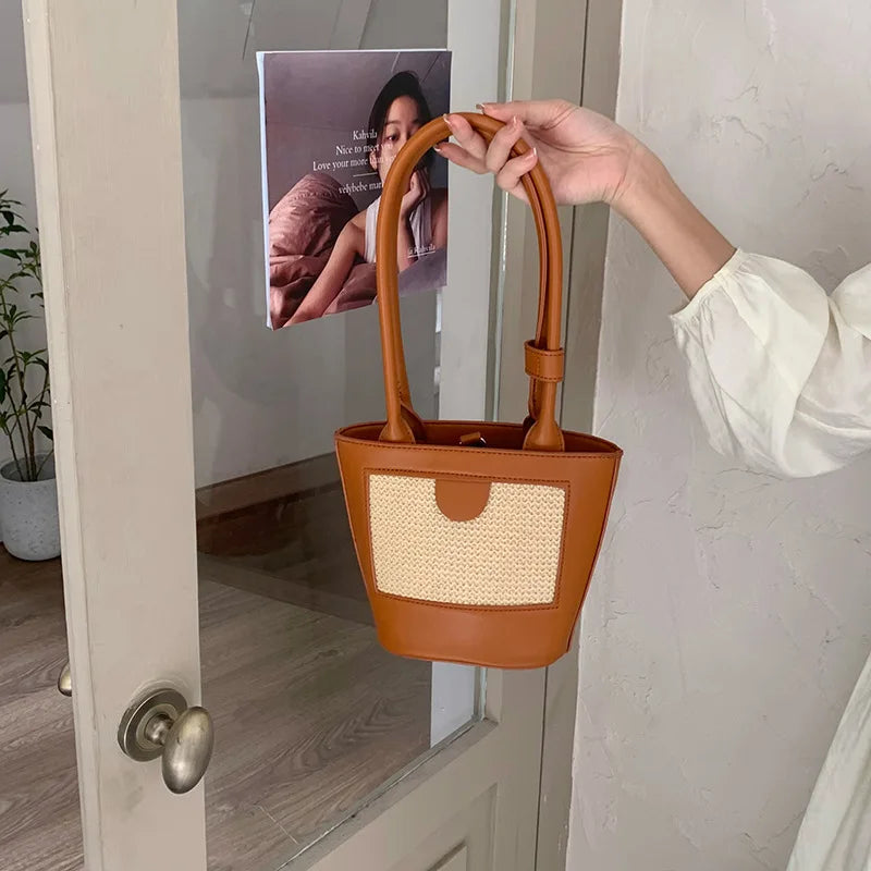 Niche Straw Bucket Bag Female Portable Small Bag Retro Hand Carrying Shoulder Un