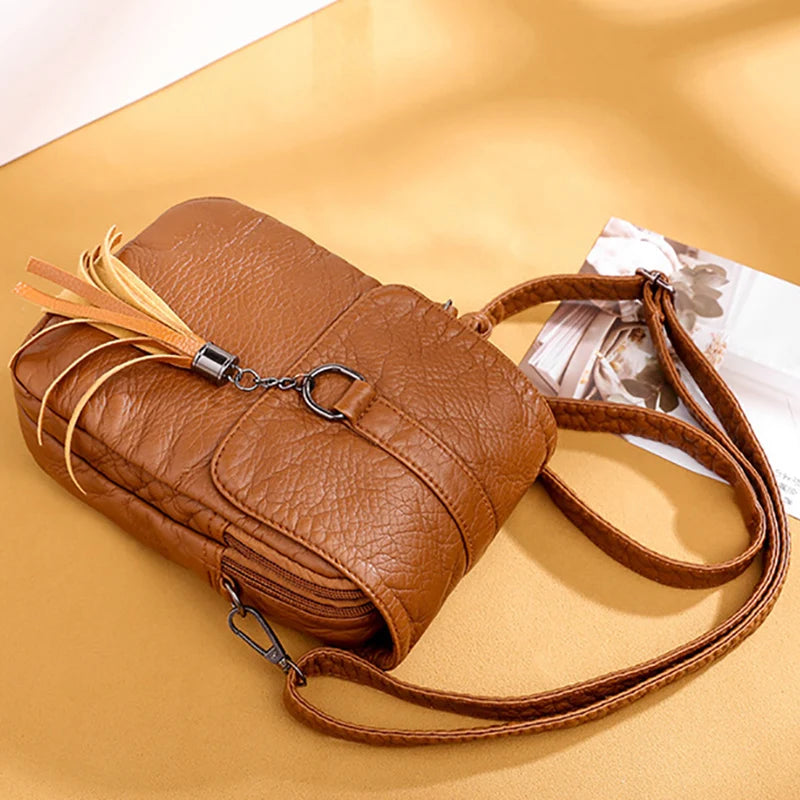 Soft Leather Crossbody Bag with Tassel Shoulder Strap