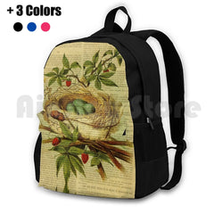Vintage Bird Nest Sports Backpack on Old Book