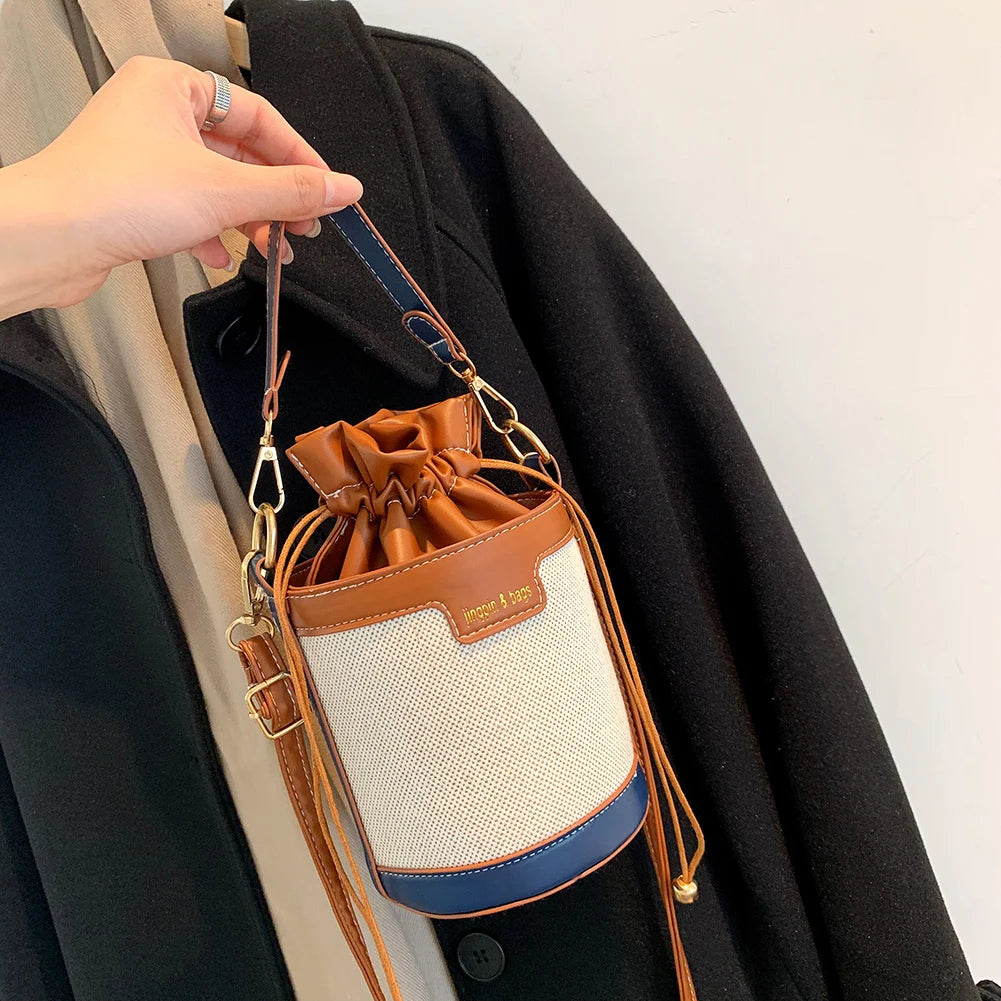 Vintage Patchwork Drawstring Crossbody Bag Cylinder PU Leather Handbag