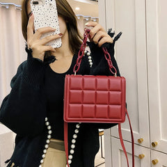 Embossed Leather Flap Crossbody Bag