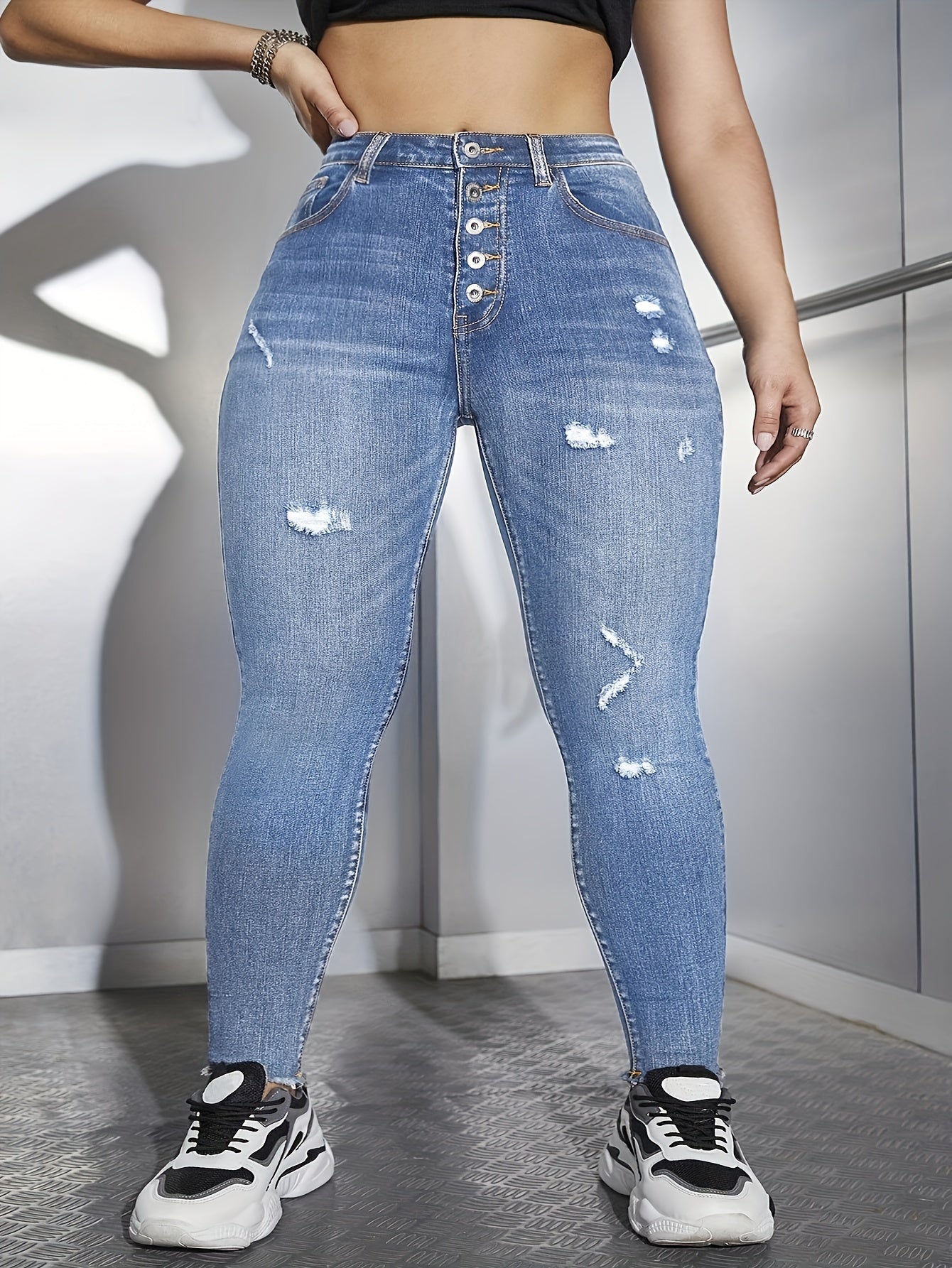 Ripped Fringe Trim Skinny Jeans