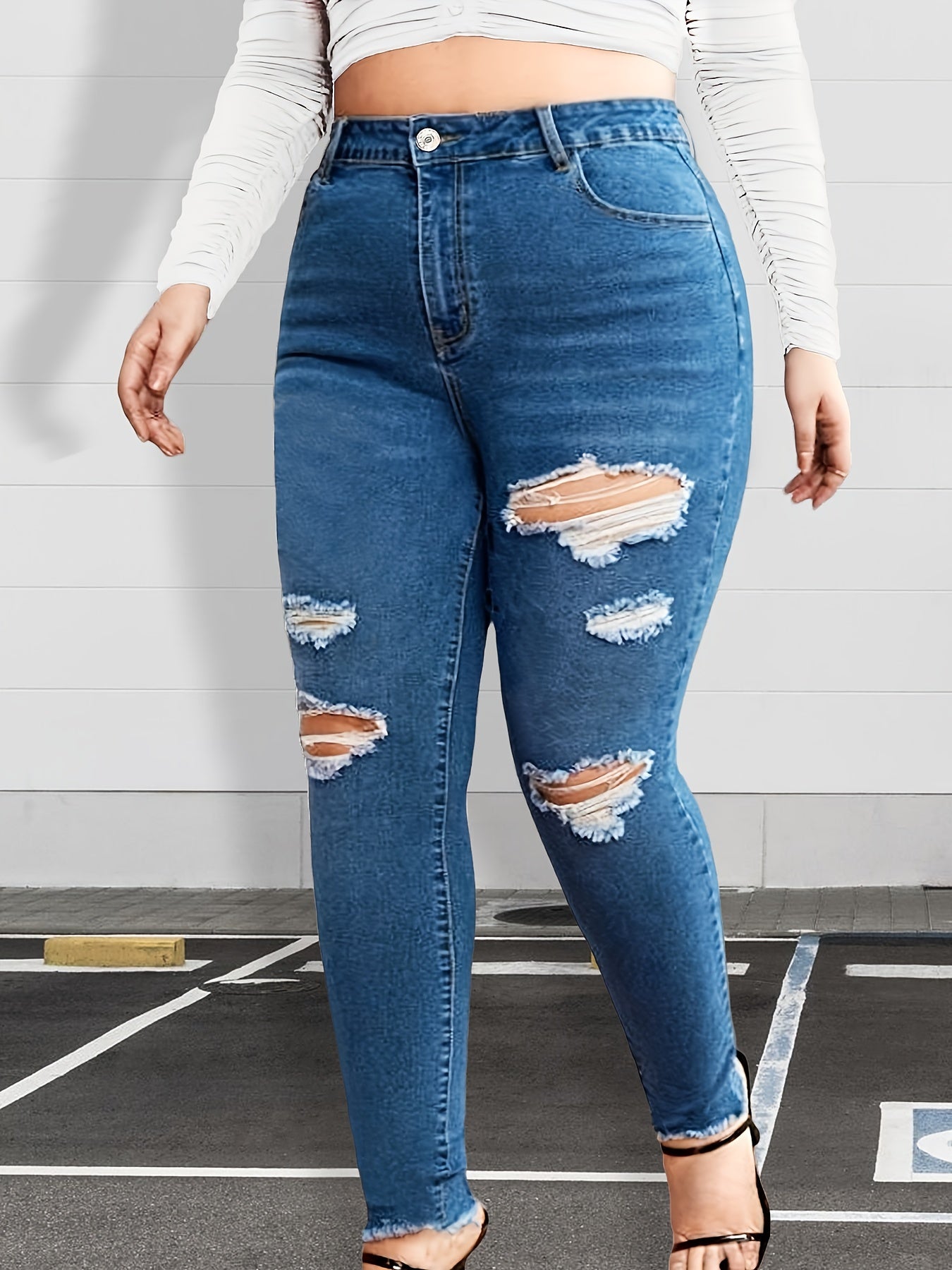 Ripped High Rise Skinny Jeans