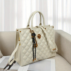Beige Quilted Tote Bag with Zipper Closure and Shoulder Strap