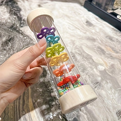 Recycled Wood Rain Sound Tube Toy with Colorful Beads & Alphabet Rings