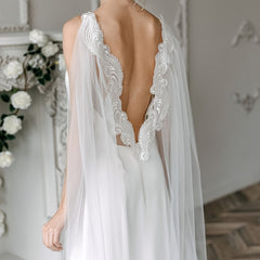 Elegant Lace Wedding Gown with Flowing Train