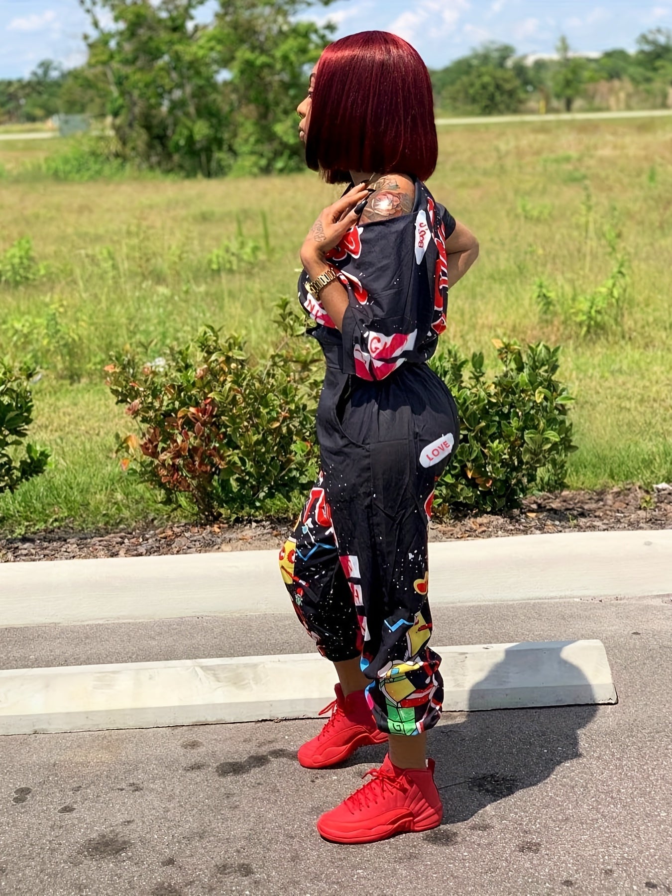 Graffiti Print Long Sleeve Button Jumpsuit