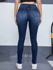 Ripped High Rise Skinny Jeans with Fringe Trim