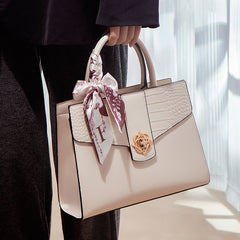 Chic Two-Layer Leather Handbag with Tassel Elements