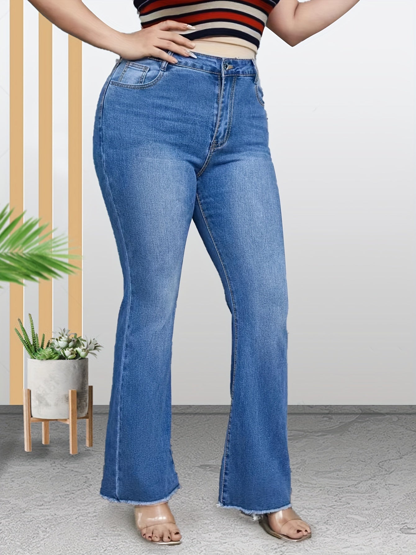 High Rise Flared Leg Jeans with Fringe Trim