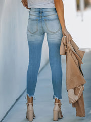 Washed Ripped Fringe Skinny Jeans