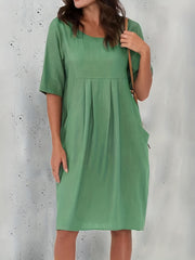 Solid Short Sleeve Round Neck Pleated Dress With Pockets