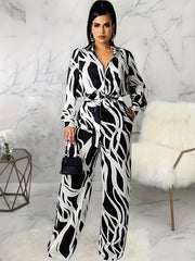 Abstract Striped Print Long Sleeve Belted Jumpsuit Plus Size
