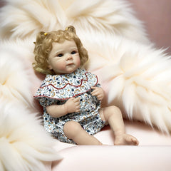Lifelike Reborn Girl Doll with Rooted Hair & Floral Print Dress