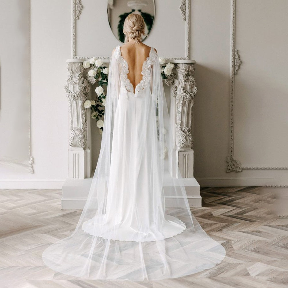 Elegant Lace Wedding Gown with Flowing Train