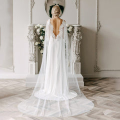 Elegant Lace Wedding Gown with Flowing Train