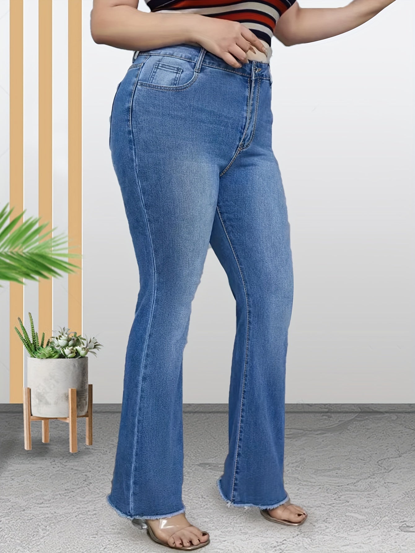 High Rise Flared Leg Jeans with Fringe Trim