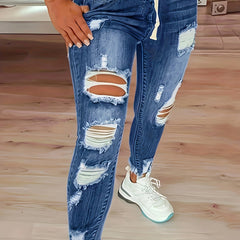 Ripped Elastic High Rise Skinny Jeans