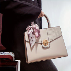 Chic Two-Layer Leather Handbag with Tassel Elements