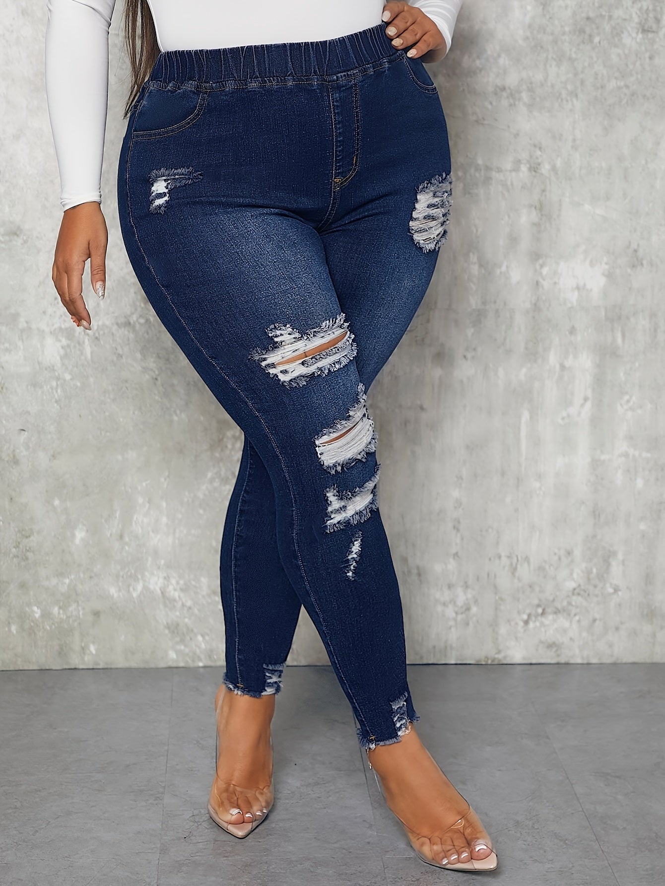 Ripped Fringe Raw Trim Skinny Jeans