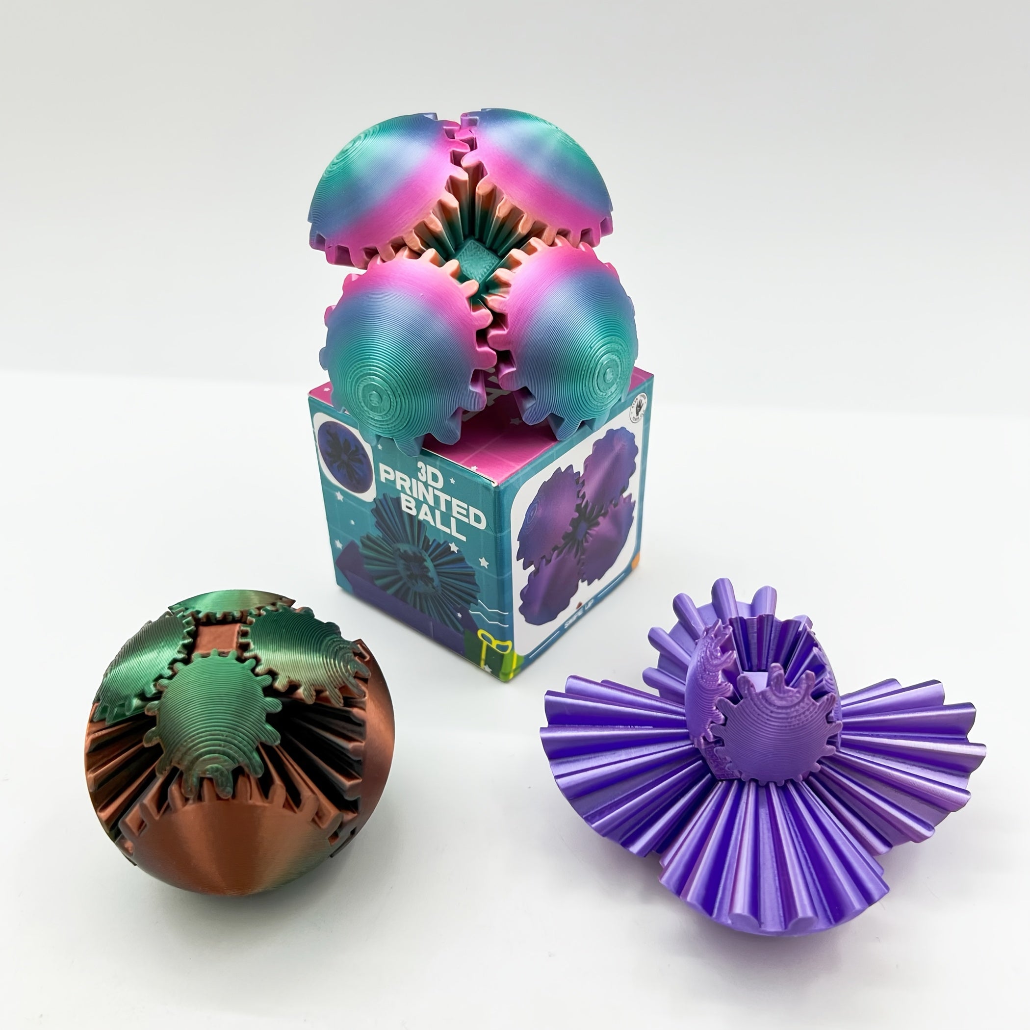 3D Printed Multicolor Gradient Gear Ball Spinning Sphere Stress Relief Model