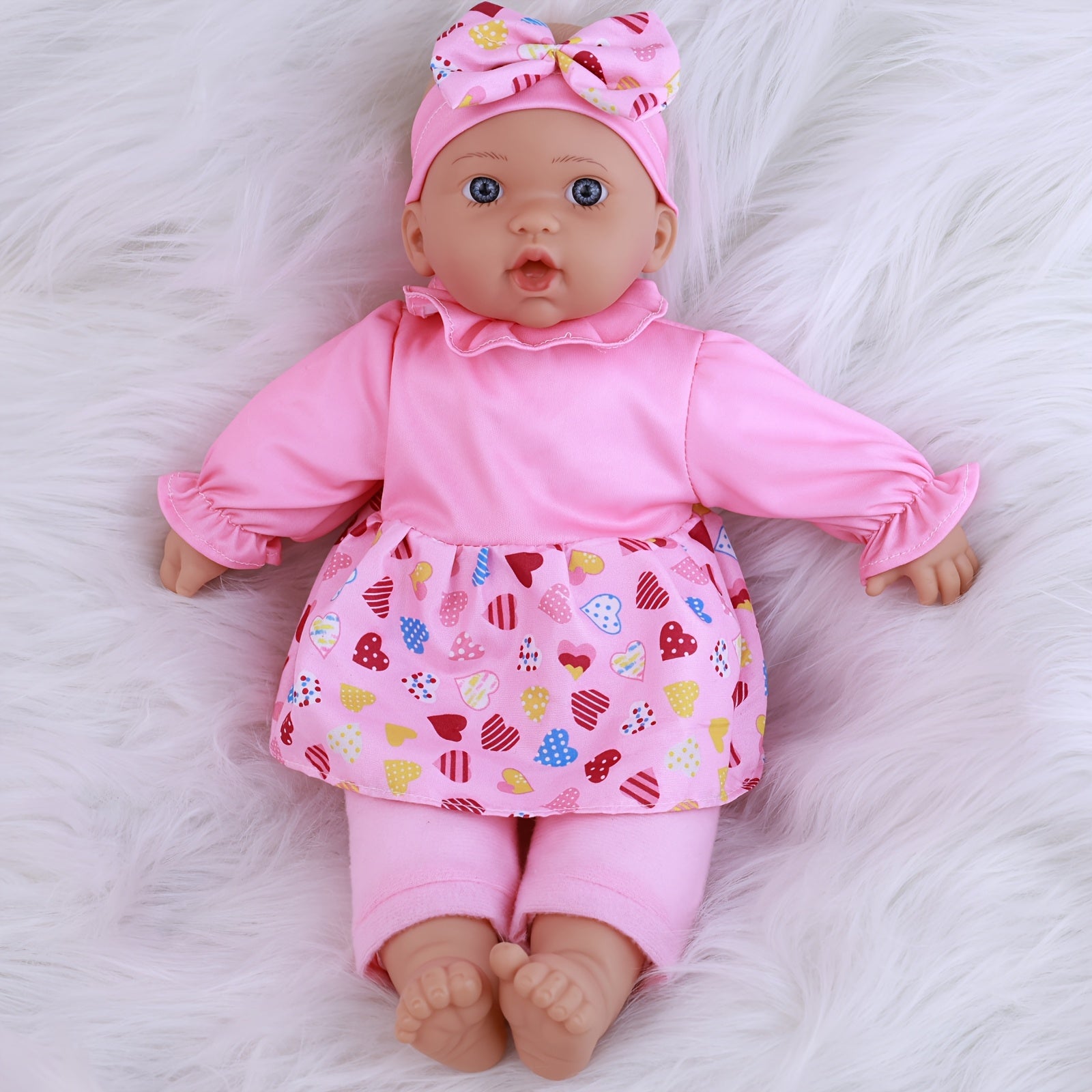 WERFLOT Reborn Baby Doll Soft Body Lifelike Pink Outfit Colorful Patterns