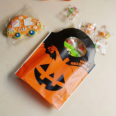 50pcs Halloween Party Gift Bag Plastic Goodie Candy Bag Pumpkin Candy Bag