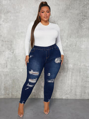 Ripped Fringe Raw Trim Skinny Jeans