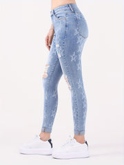 Star Print Ripped High Rise Skinny Jeans