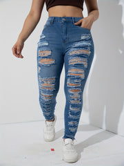 High Stretch Skinny Jeans with Ripped Fringe Trim
