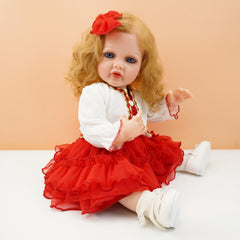 22 Inch Vinyl Doll with Golden Hair and Eyes Soft Body Pink Dress