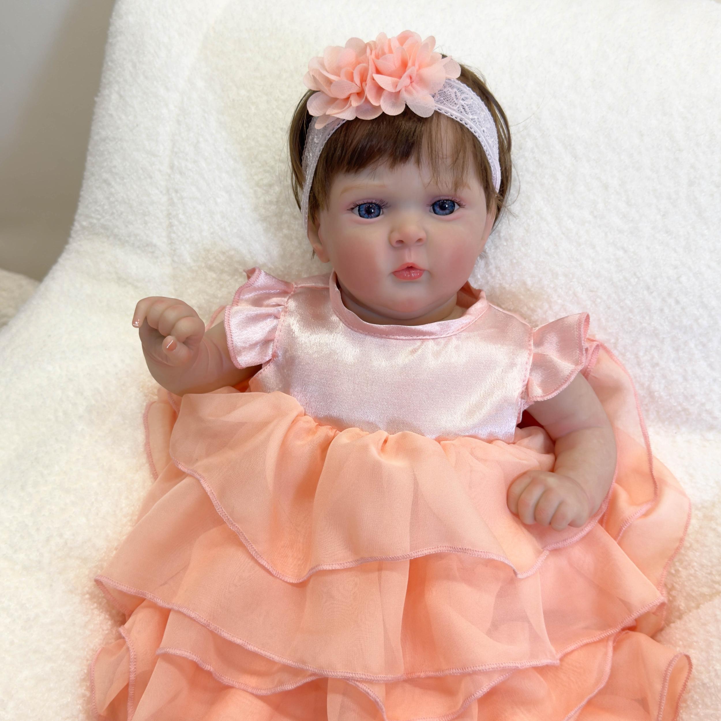 Adorable Reborn Baby Girl Doll with Peach Dress and Pink Hair Bow