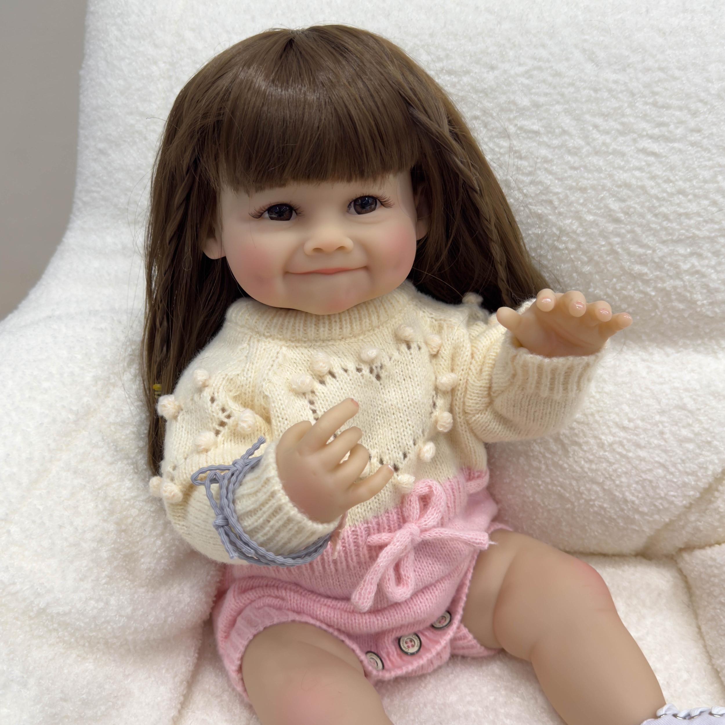 Realistic Silicone Vinyl Reborn Doll with Pink Knitted Outfit