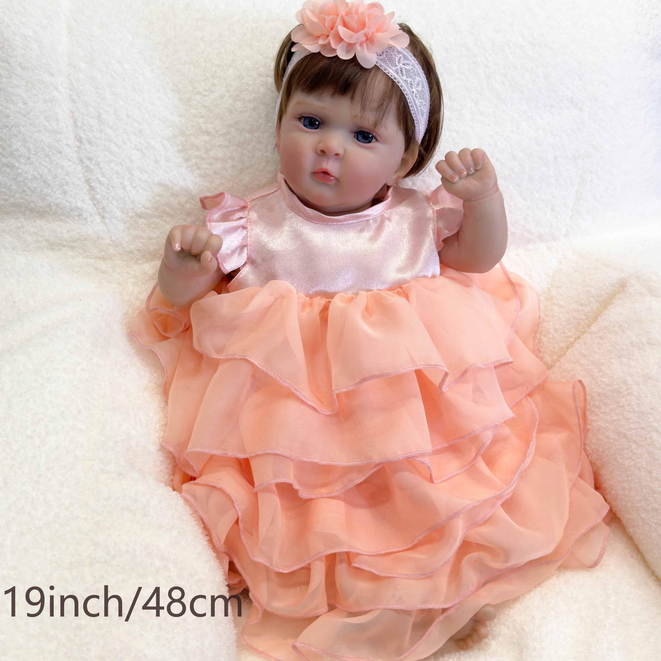 Adorable Reborn Baby Girl Doll with Peach Dress and Pink Hair Bow