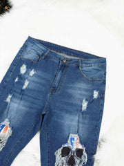 Skull Print Washed Button Fly Medium Stretch Jeans