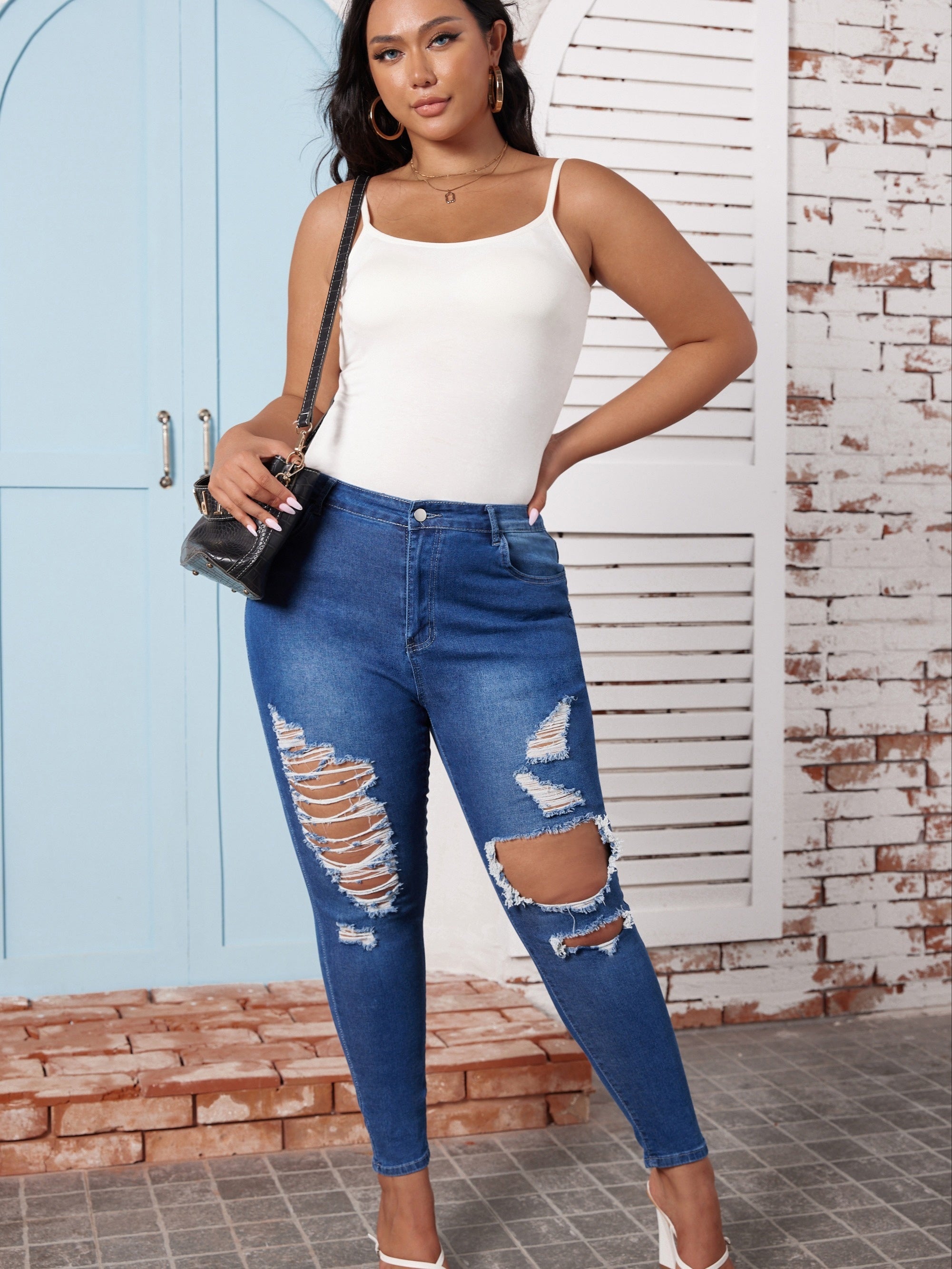  High Rise Ripped Button Fly Skinny Jeans