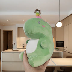 Soft Green Dinosaur Plush Toy with Pink Accents & Floral Accents