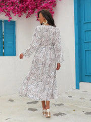  Allover Print Long Sleeve V Neck Maxi Dress With Tassel