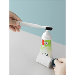 Automatic Toothpaste Dispenser Rolling Squeezer Holder