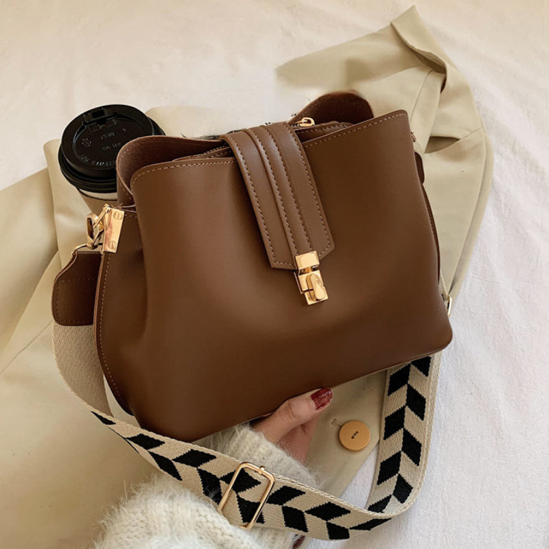 Minimalist Bucket Bag with Geometric Strap