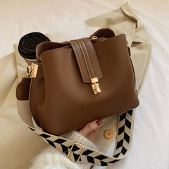 Minimalist Bucket Bag with Geometric Strap