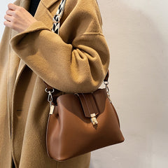 Minimalist Bucket Bag with Geometric Strap