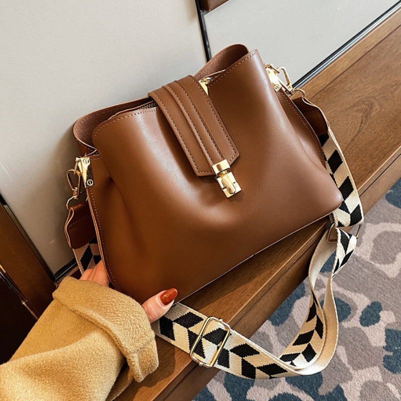Minimalist Bucket Bag with Geometric Strap