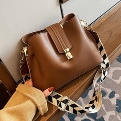 Minimalist Bucket Bag with Geometric Strap