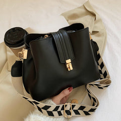 Minimalist Bucket Bag with Geometric Strap